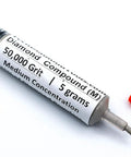 Oil based diamond polishing paste with 50,000 grit and 25 percent diamond powder in a syringe with red cap.