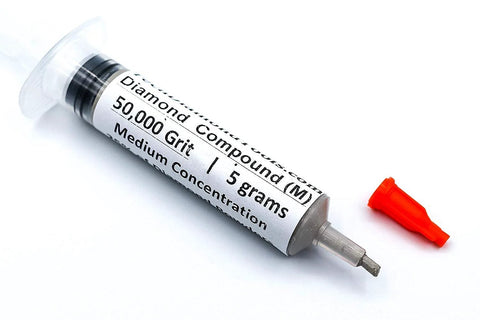 Oil based diamond polishing paste with 50,000 grit and 25 percent diamond powder in a syringe with red cap.