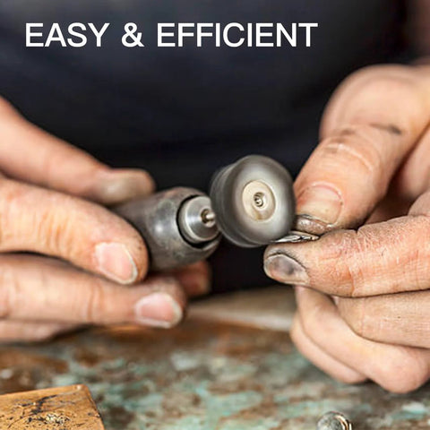 Hands using a rotary tool with high density diamond polishing paste, 3,000 grit for mirror finishes on metal jewelry, shown up close