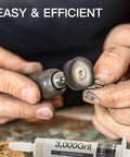 Person using 3,000 grit syringe from eight-pack diamond polishing paste kit for mirror finishes on metal surface.