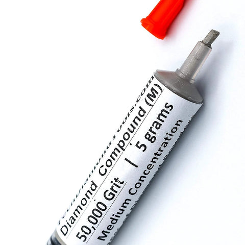 Oil based diamond polishing paste with 50,000 grit and 25 percent diamond powder in a syringe, medium concentration.
