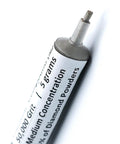 Close-up of a syringe labeled 50,000 grit, oil based diamond polishing paste with 25 percent diamond powder for precision finish.