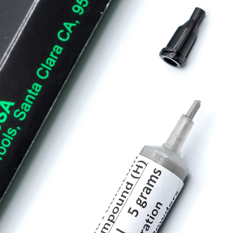 Achieve ultra high gloss on marble glass metal jewelry resin and stone with USA made diamond polishing paste, syringe close-up