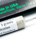 Close-up of USA made diamond polishing paste with 3000 grit high concentration diamond powder in 5 grams syringe.