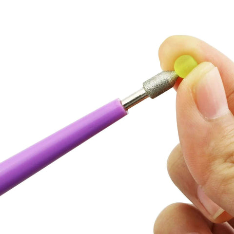 Close-up of Diamond Tipped Bead Reamer Set 5 Piece For DIY Beaders And Jewelry Makers Quickly Enlarges Bead Holes In Use