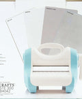 Front view of Revolution Portable Die Cutting And Embossing Machine With Magnetic Platform, including embossing and cutting plates.