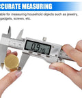 Person using Digital Caliper Measuring Tool, Stainless Steel Vernier Caliper Digital Micrometer with Large LCD Screen on metal object