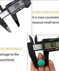 Electronic Digital Calipers, inch and Millimeter Conversion, close-up of LCD screen measuring tool on small objects, DIY/Jewelry Measurement