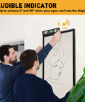 Two people using a Digital Level With 11.5 Inch LCD Display And 360 Degree Inclinometer For Vertical And Horizontal Angles on a wall frame.