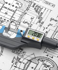 Digital Micrometer 0 To 1 Inch And 0 To 25 Mm With Large LCD Display 0.00005 Inch on technical blueprint background