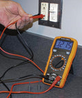 Multimeter, Digital Manual-Ranging 600V AC/DC Voltage Tester, used for measuring voltage from an electrical outlet.