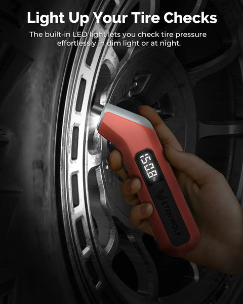 Digital Tire Pressure Gauge 3 To 200 PSI ANSI B40.7 Grade 2A Plus Minus 0.5 Percent Accuracy Industrial Calibrated Replaceable AAA Batteries Quick Readouts Durable Vivid Orange Gauge For Cars Trucks SUVs showing LED display near tire
