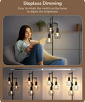 Woman reading beside dimmable farmhouse floor lamp with industrial style standing light for living room and bedroom by EDISHINE