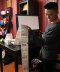Person using printer with Direct Thermal 4x6 Shipping Labels Pack of 500 Fanfold Perforated With Strong Adhesive