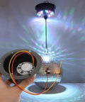 Heavy Duty Disco Ball Motor Rotator With Six Mounting Holes For Easy Secure Installation 110V Mirror Ball Motor displayed with disco light