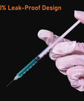 Gloved hand holding Disposable 1ml Syringe With Cap 31G One Quarter Inch 6mm Sterile Individually Packed Pack Of 20 showing leak-proof design