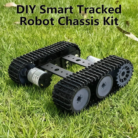 Robot Tracked Chassis Starter Kit With Two Tracks for Arduino Raspberry Pi MicroBit, black metal chassis on grass, side view.