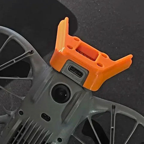 DJI Neo 2 Antenna Protective Cover Orange Rugged Precision Fit Drone Accessory With Snap On Installation For Enhanced Antenna Protection Weatherproof Shield Safe Flights In Harsh Environments installed on drone