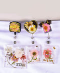 Doctor Badge Rollers Silicone Molds For Epoxy Resin Crafting Heart Tooth And Stethoscope Shapes displayed on lanyards