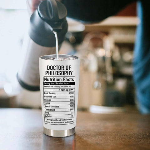 Pouring coffee into Personalized 20 Oz PhD Tumbler For Women And Men, Doctor Of Philosophy Gift, Custom Doctoral Degree Cup With Nutrition Facts.