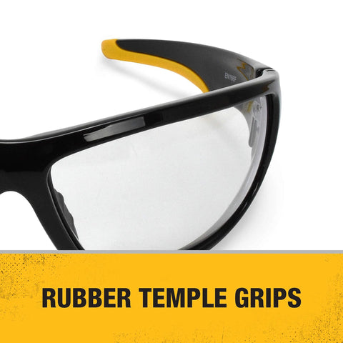 Close-up of Dominator Z87 Plus Safety Glasses with black full frame and clear lenses, highlighting rubber temple grips.