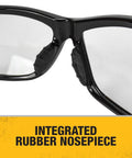 Close-up of Dominator Z87 Plus Safety Glasses with black full frame, clear lenses, and integrated rubber nosepiece.