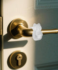 Silicone wall shield with shock absorbing cushion and noise silencer design protects doors, walls and furniture, installed on door.