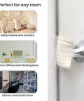 Door Noise Blocker With Elastic Straps Easy Install Latch Cover That Hushes Door Slams For All Doors 4x3 Inches Thick Fabric installed on door.