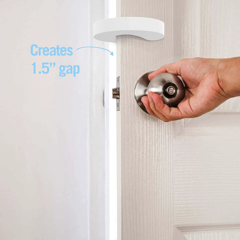 Door Pinch Guard And Door Stopper Six Pack With Soft Foam Safety Guards To Keep Doors Open, shown installed on door.