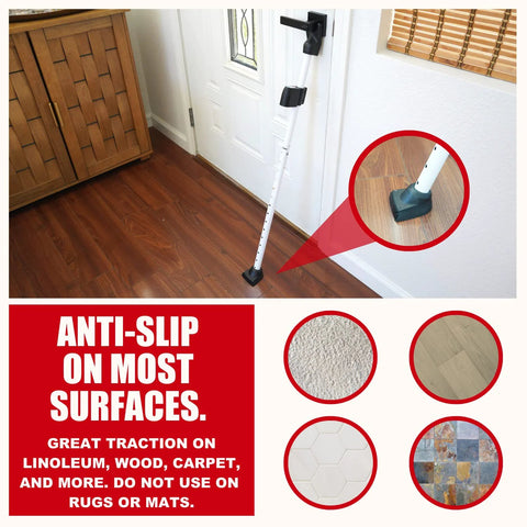 Door Security Bar With Alarm For Enhanced Home Safety 120 dB Loud Alarm 2 In 1 Door Stopper And Sliding Door Jammer Prevent Break Ins With Vibration Sensor And Easy To Install Heavy Duty Construction For Peace Of Mind installed on wooden floor, showing anti-slip base.