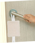 Close-up of a Three Piece Door Silencers No Drill Easy Install Cushions For Noise Reduction Door Slam Stoppers Protect Fingers And Walls on door