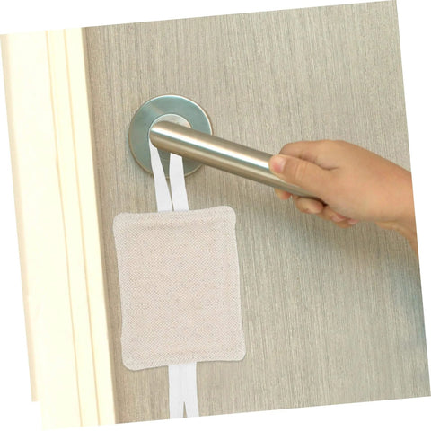 Experience peaceful rooms with easy, tool-free door silencers installed on a door handle, beige cushion visible.