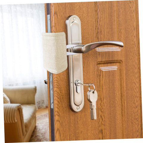 Close-up of Nine Piece Door Silencers Noise Reduction Cushions For Doors Easy Install No Drill Latch Covers on wooden door