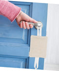 Woman installing Six Piece Door Silencers And Stoppers For Nursery No Drilling Required Easy To Install Prevent Slamming on blue door