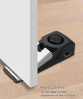 Door Stop Alarm with 120DB Siren Door Stop for Home & Travel (Black) placed under a door, showing fit for 0.6-1.2 inch gap