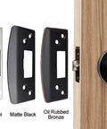 Extra Large Door Strike Plate For Heavy Duty Latch Reinforcement in matte black, satin nickel, and oil rubbed bronze next to a door knob.