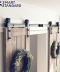 6.6 Ft Double Barn Door Hardware Kit For Sliding Doors With Smooth Quiet Track And Easy Installation Includes Detailed Installation Guide For 20 Inch Wide Door Panel J Shape Hanger Black Finish installed in home