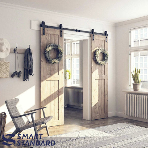6.6 Ft Double Barn Door Hardware Kit For Sliding Doors With Smooth Quiet Track And Easy Installation Includes Detailed Installation Guide For 20 Inch Wide Door Panel J Shape Hanger Black Finish installed in a living room.