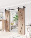 Premium Black Finish Wood Double Sliding Barn Door Hardware Kit installed in living room, showing wood doors and steel tracks.