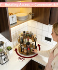 Woman using 12 Inch Wood Lazy Susan Organizer for Cabinet With Double Layer Rotating Design and Plum Blossom Shape for spices and jars.