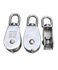 Stainless steel pulleys with hooks, different views including front and side, used for lifting and rigging applications.