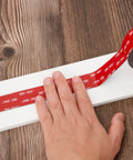 Heavy Duty Double Sided Foam Tape 0.5 Inch By 15.4 Feet 5925 Mega Sticky Mounting Tape being applied to wood surface.