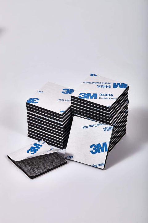 Stack of square foam pieces from Heavy Duty No Fuss Double Sided Foam Tape Kit With Waterproof Adhesive Mounting Tape In Square And Rectangular Pieces Perfect For Crafts Photos Walls Home Office Car DIY Projects 100 Pieces.