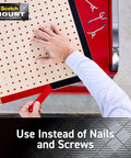 Person using Extreme Heavy Duty Double Sided Mounting Tape Black 1 Inch By 33.3 Feet on a red surface with tools visible.