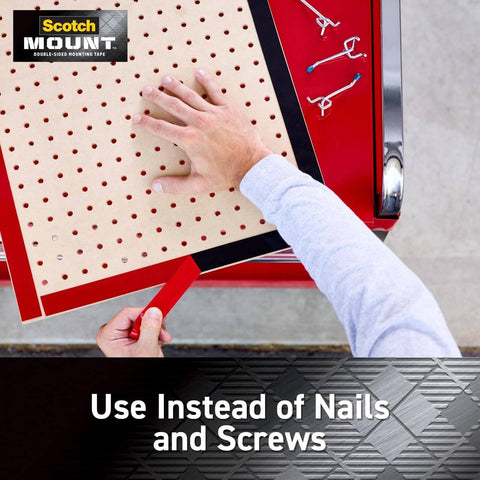 Person using Extreme Heavy Duty Double Sided Mounting Tape Black 1 Inch By 33.3 Feet on a red surface with tools visible.