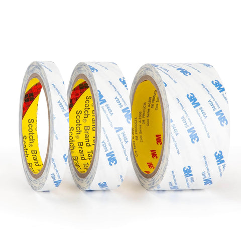 Three rolls of Double Sided Tape 0.5 Inch By 32.8 Feet Thin Translucent Removable Adhesive, branded with 3M logos.