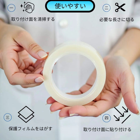 Person holding Heavy Duty Double Sided Mounting Tape Nano Adhesive Strip For Posters And Art, Clear Transparent Sticky Wall Hanger.