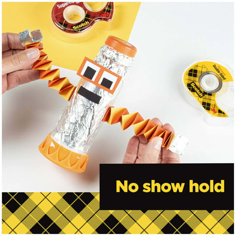 Person crafting with Clear Double Sided Tape 1/2 Inch By 36 Yards With A 3 Inch Core Permanent Adhesive On Both Sides.