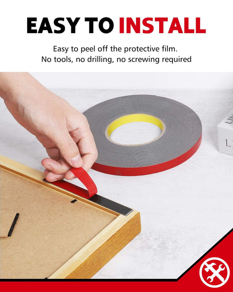 Demonstration of applying Heavy Duty Double Sided Tape 1/2 Inch By 50 Feet Waterproof Mounting Tape For Walls to a picture frame.