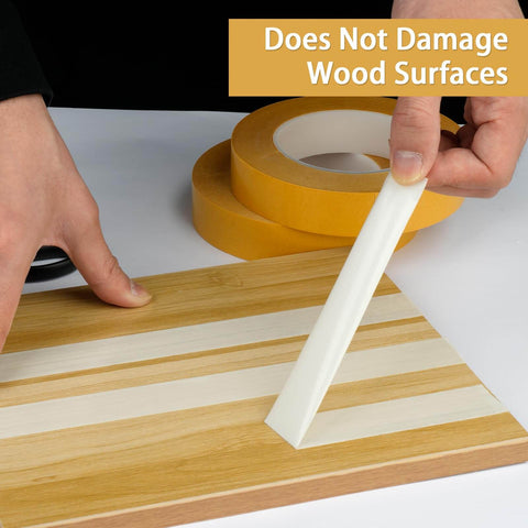 Heavy Duty Double Sided Woodworking Tape, 1 Inch Wide By 75 Feet, Two Pack, being removed from wood without residue